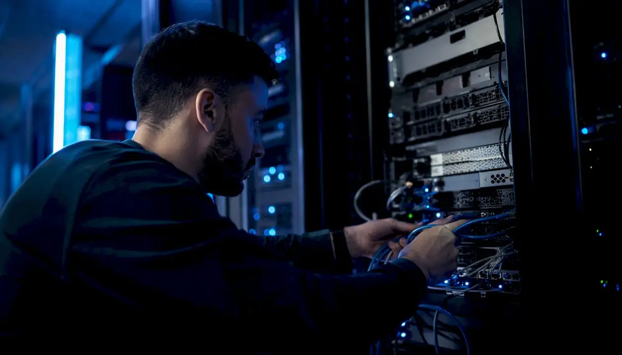 Engineer connecting AI server hardware cables