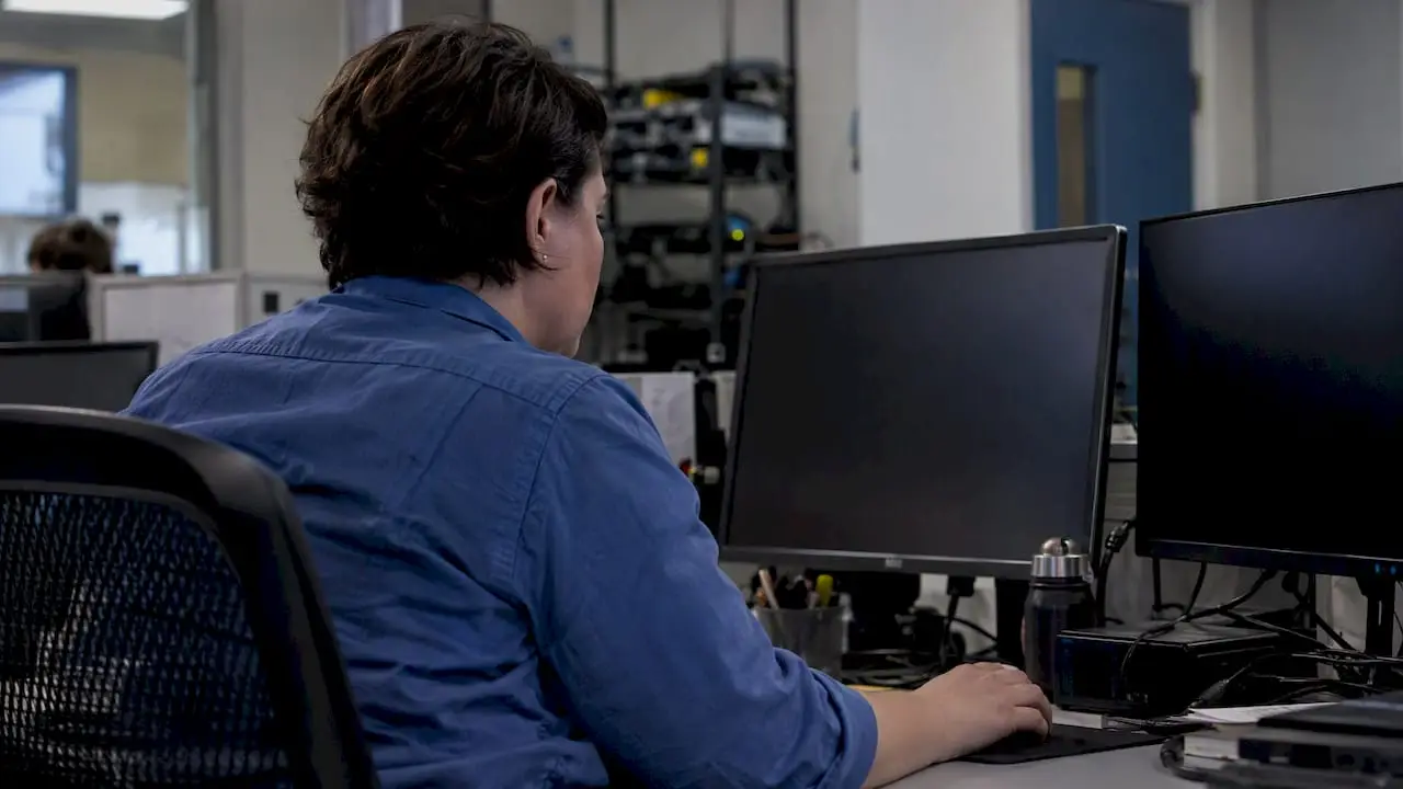 Engineer reviewing production model monitoring
